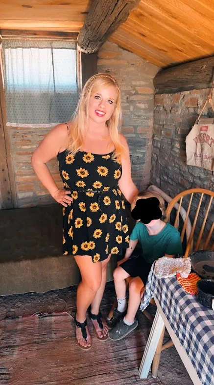 The girl in the sunflower dress.